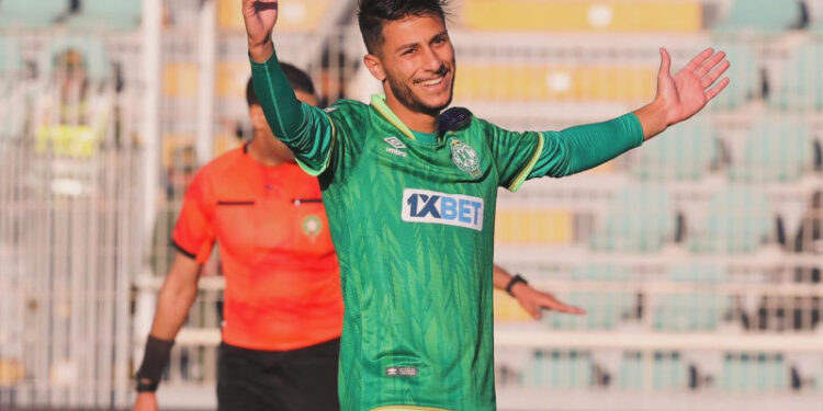 Polémique au Raja : le joueur algérien Yousri Bouzok refuse de porter le maillot floqué de la carte du Maroc